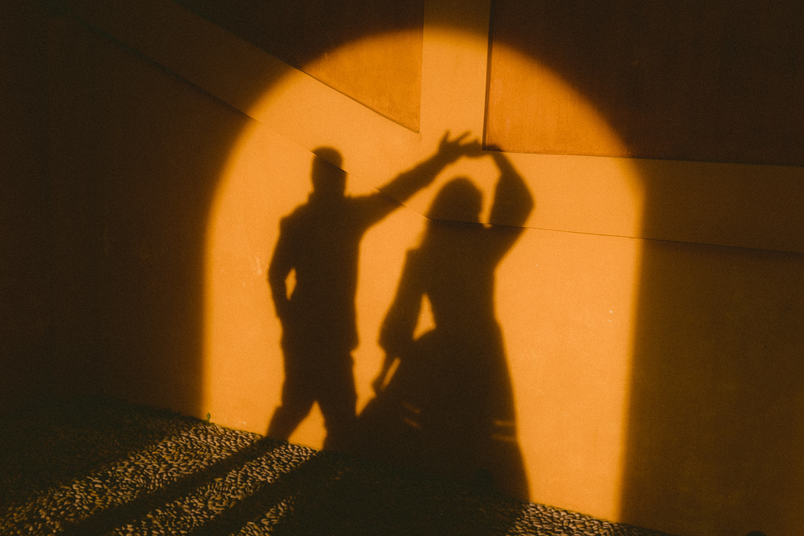 an artistic and cinematic photo of a couple dancing in menton french riviera
