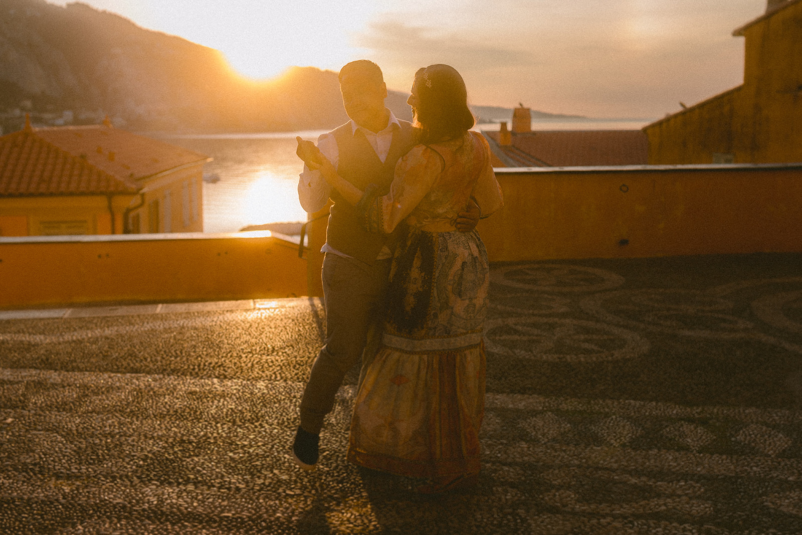 a romantic and cinematic couple photoshoot at sunrise