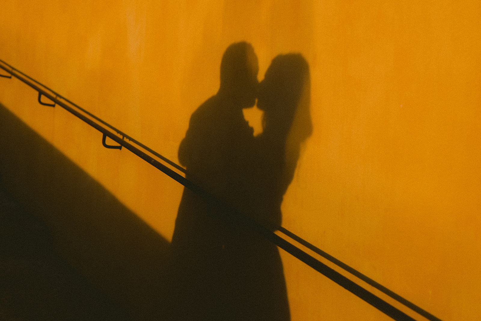 shadow of a couple kissing each other in menton