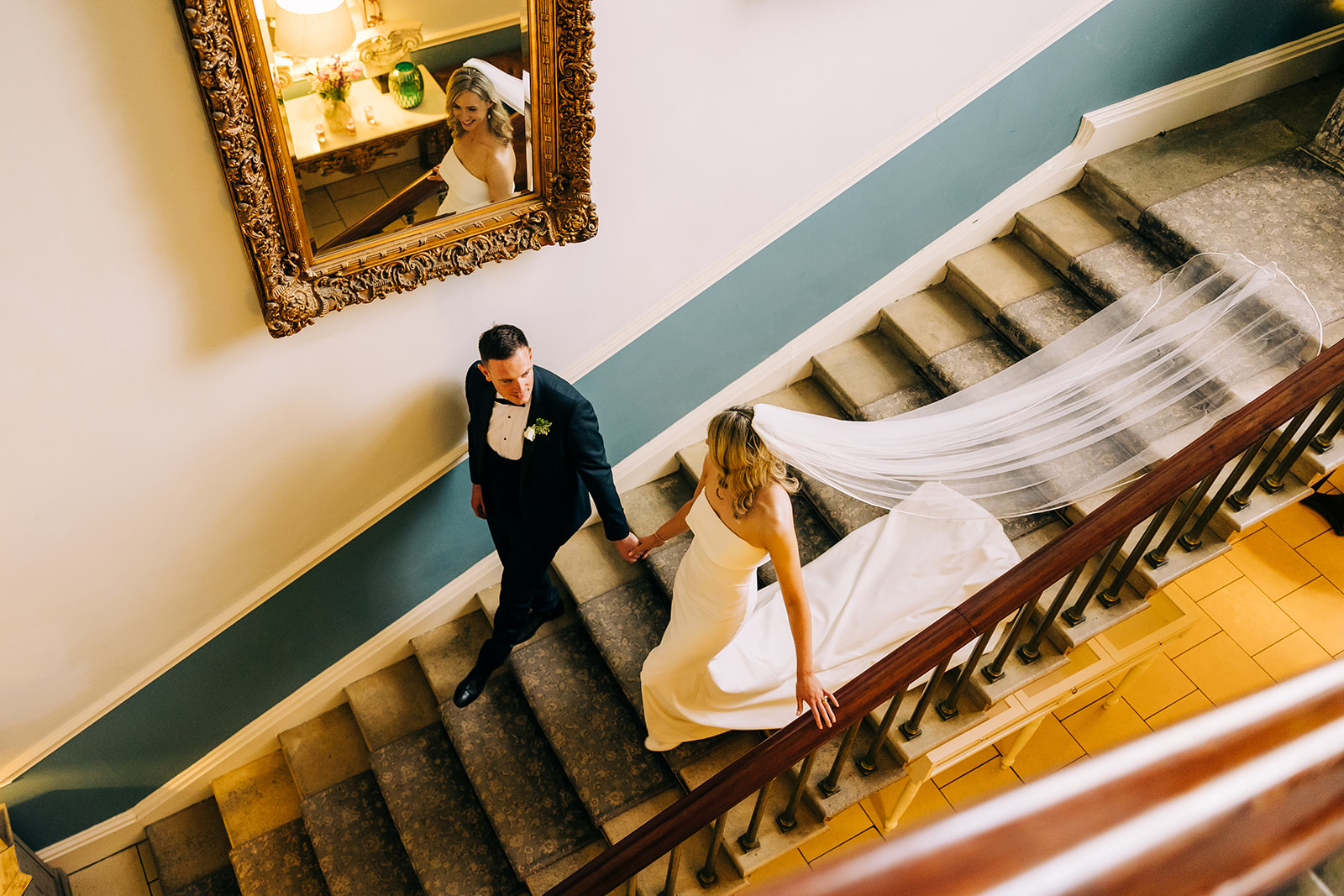 bride and groom on the stairs at castle durrow