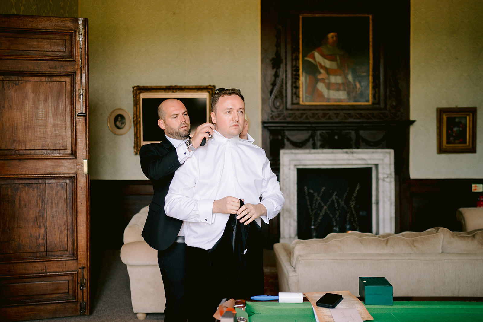 groom getting ready at brympton house