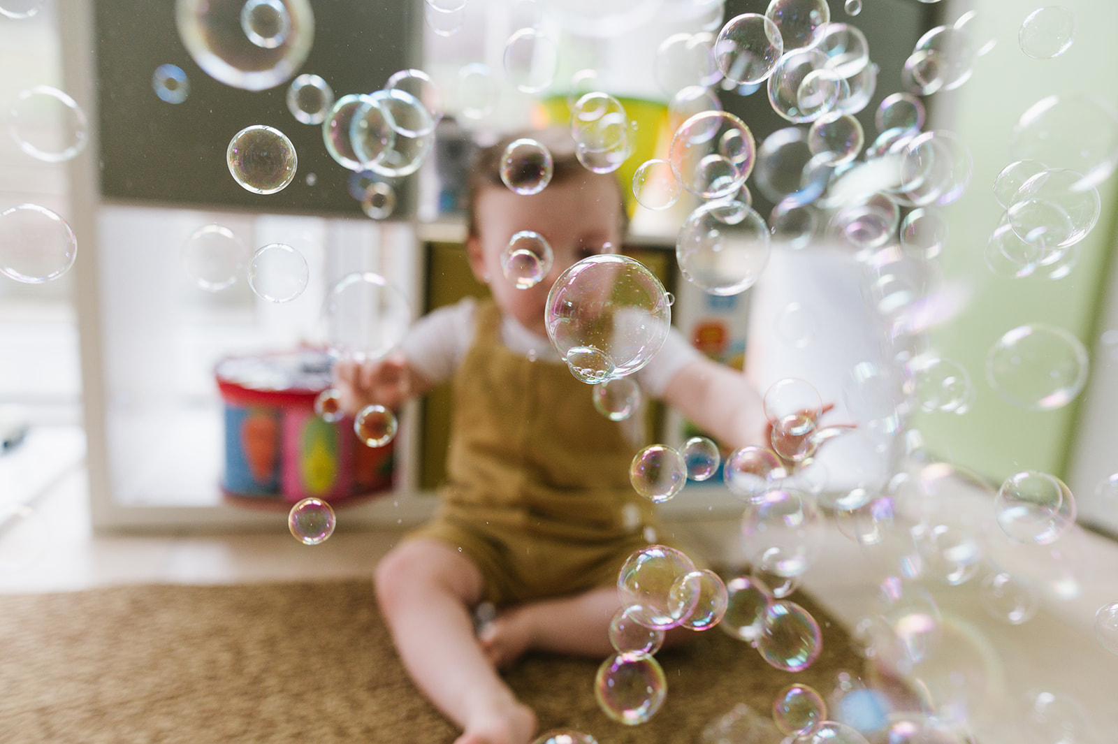 one year old with a lot of bubbles