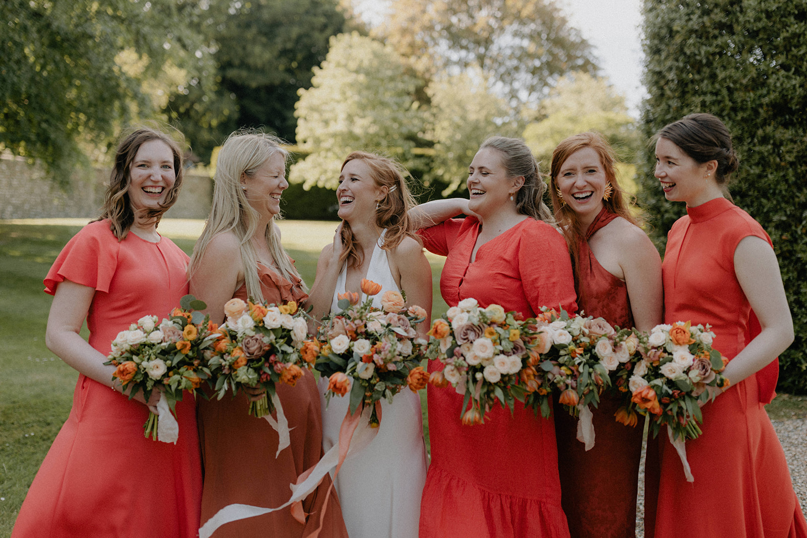 bridesmaids in orange dresses