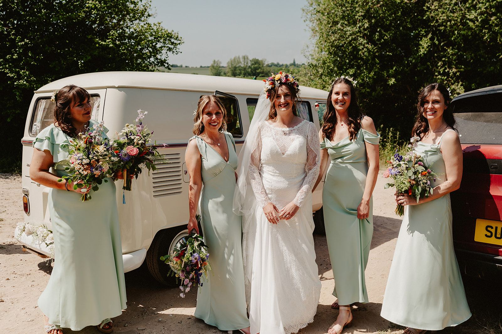 bride and her bridesmaids out of the wedding car at wilderness weddings