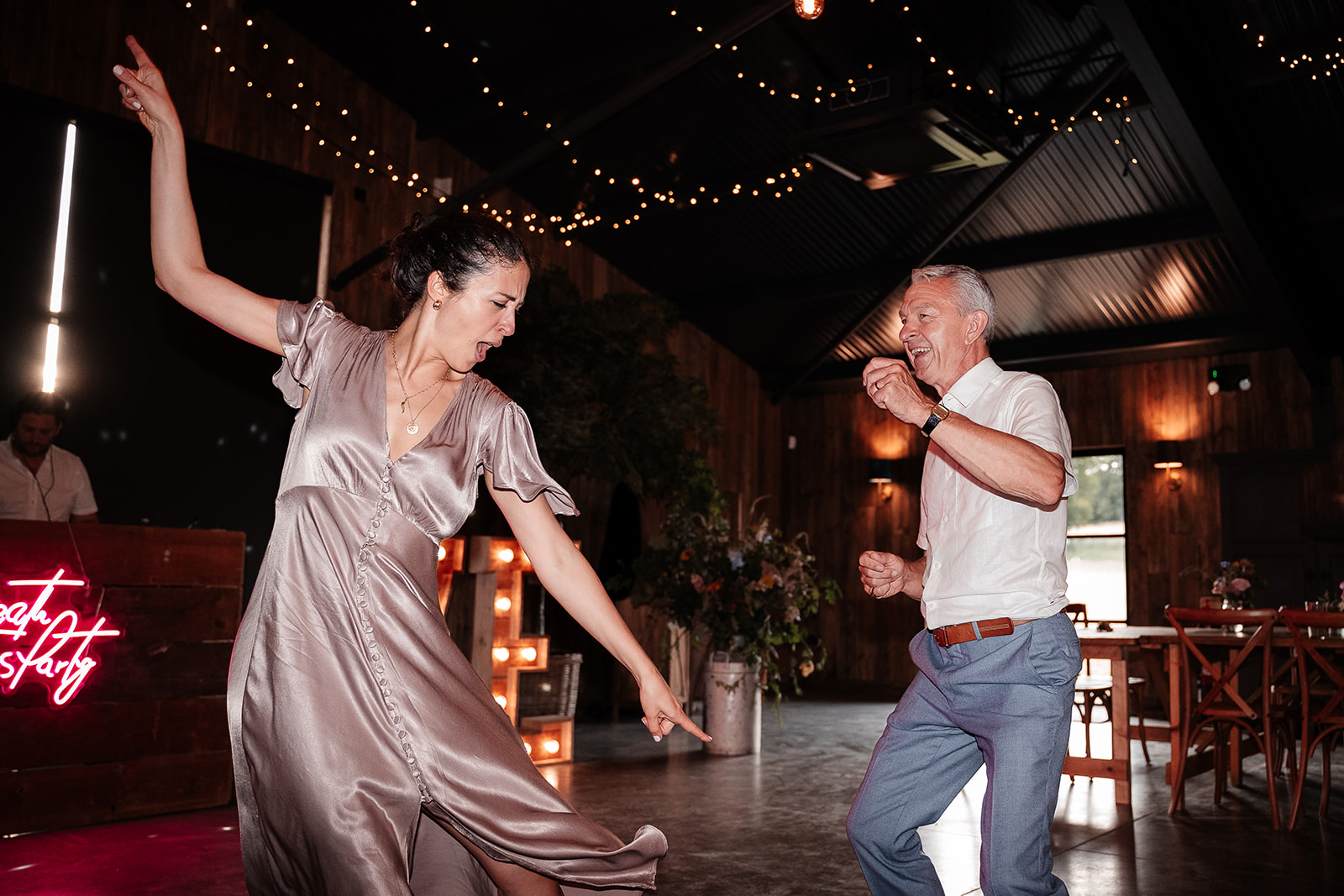 Guests dancing and having fun at a summer wedding at Silchester Farm