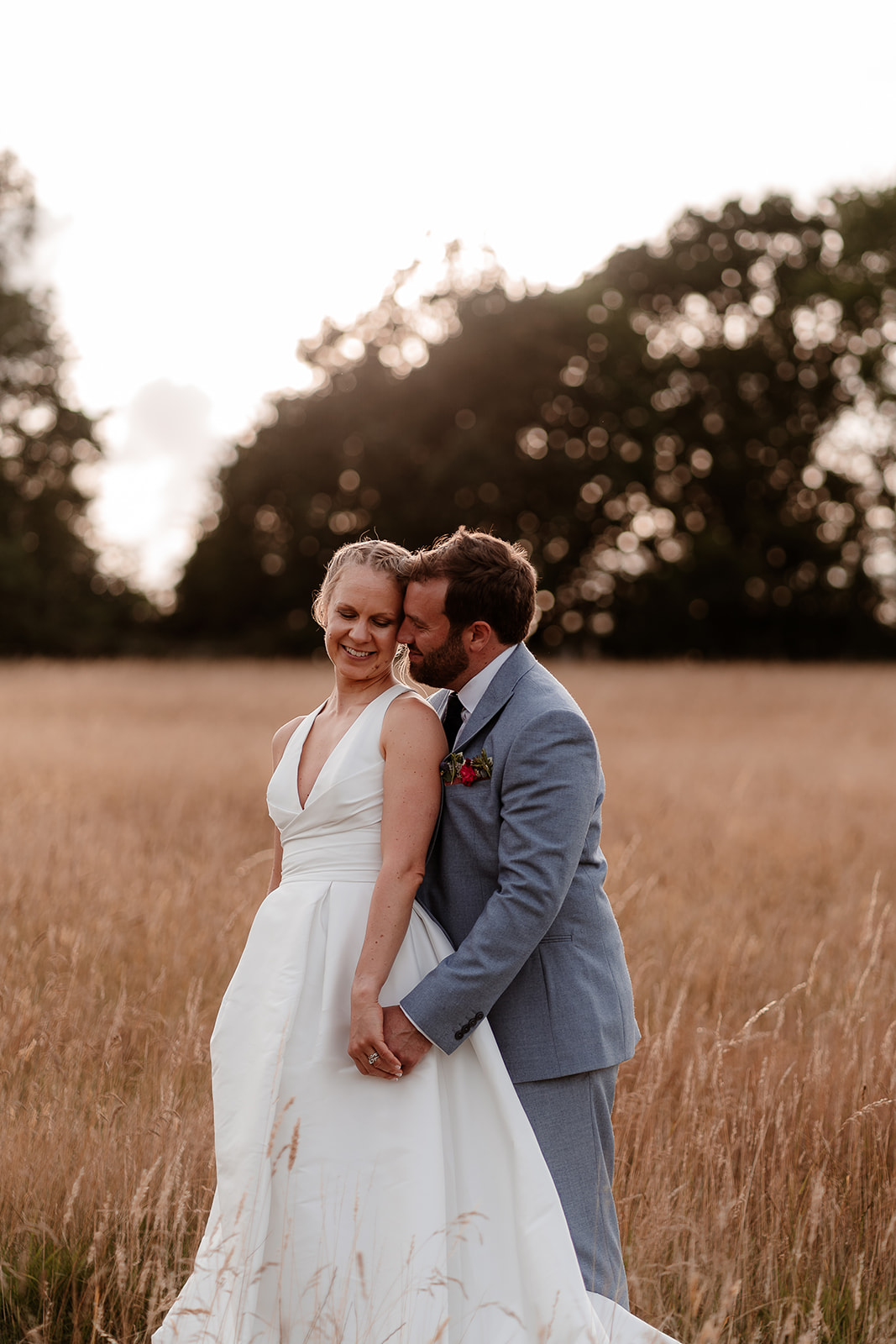Sunset Wedding Photography: Romantic sunset wedding photography capturing a couple's special moment at Silchester Farm