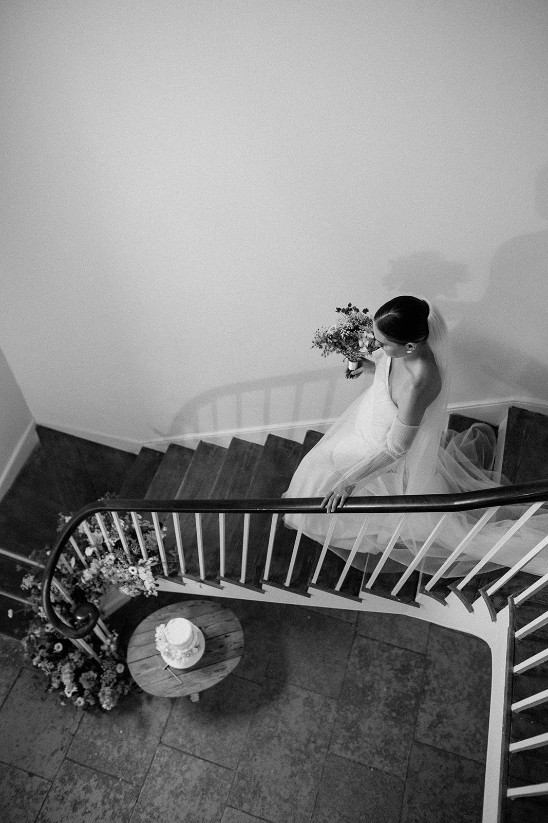 bride walking downstairs at aswarby rectory