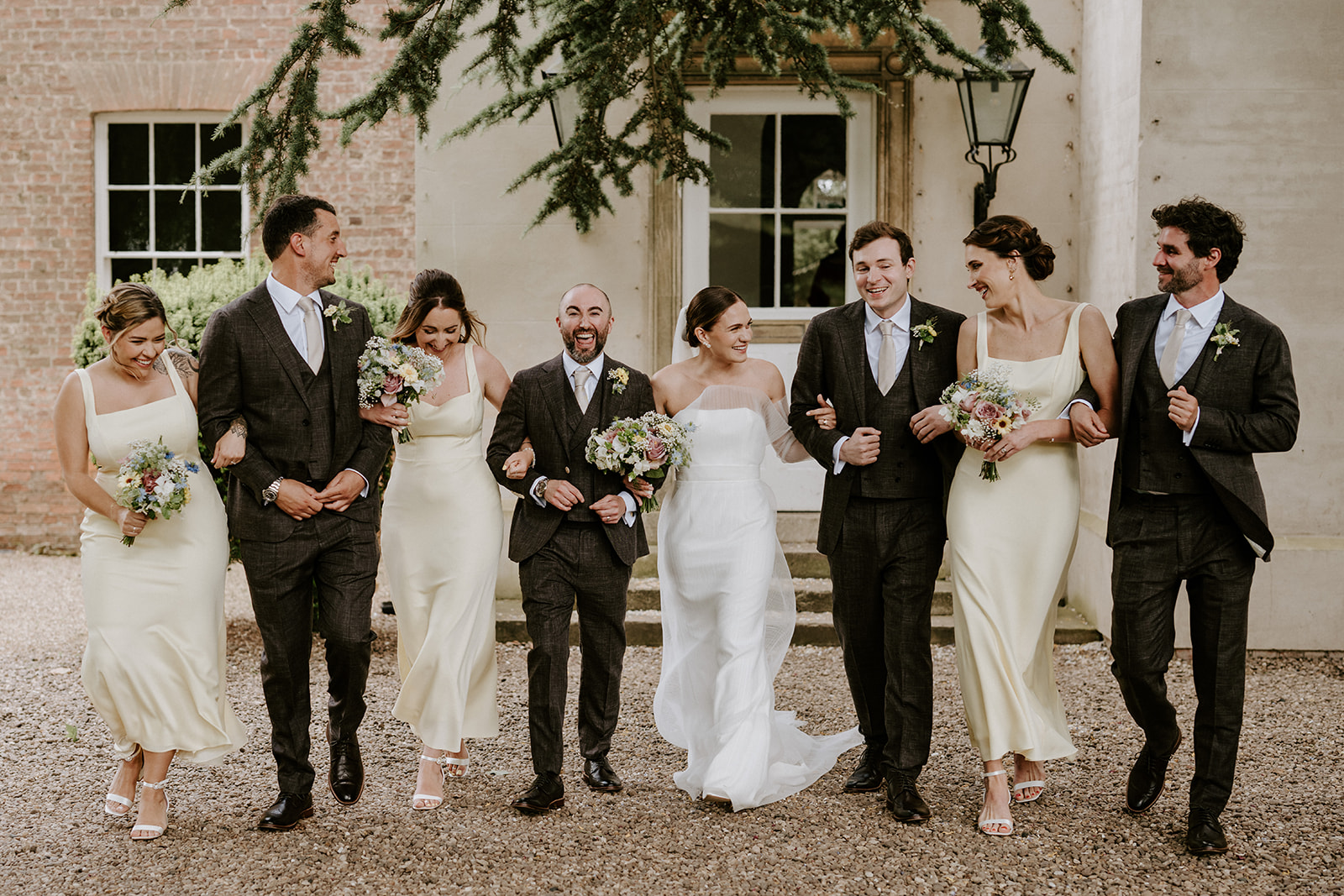 bridesmaids and groomsmen outside aswarby rectory