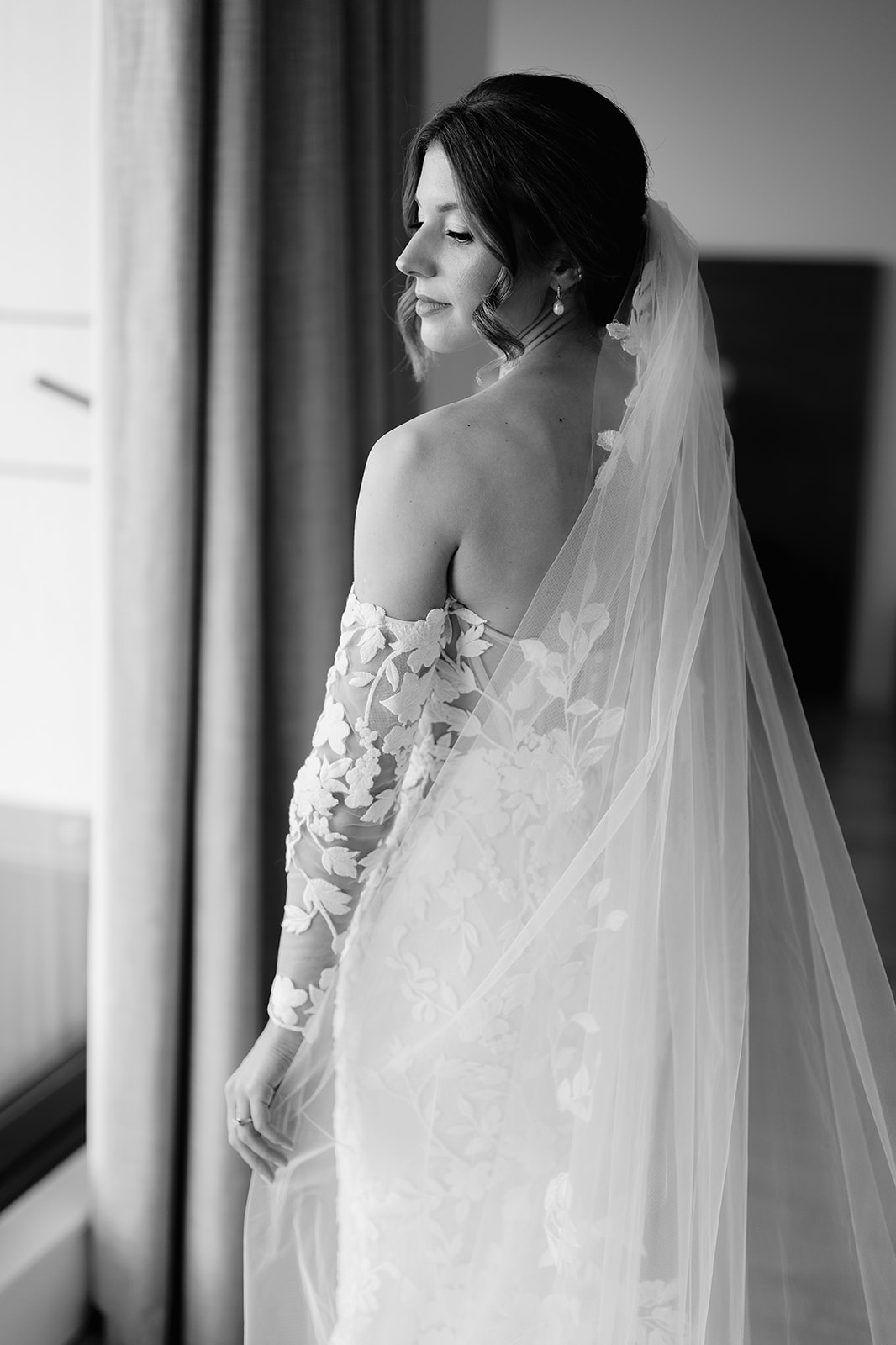 editorial portrait of bride with veil in black and white at hope st hotel