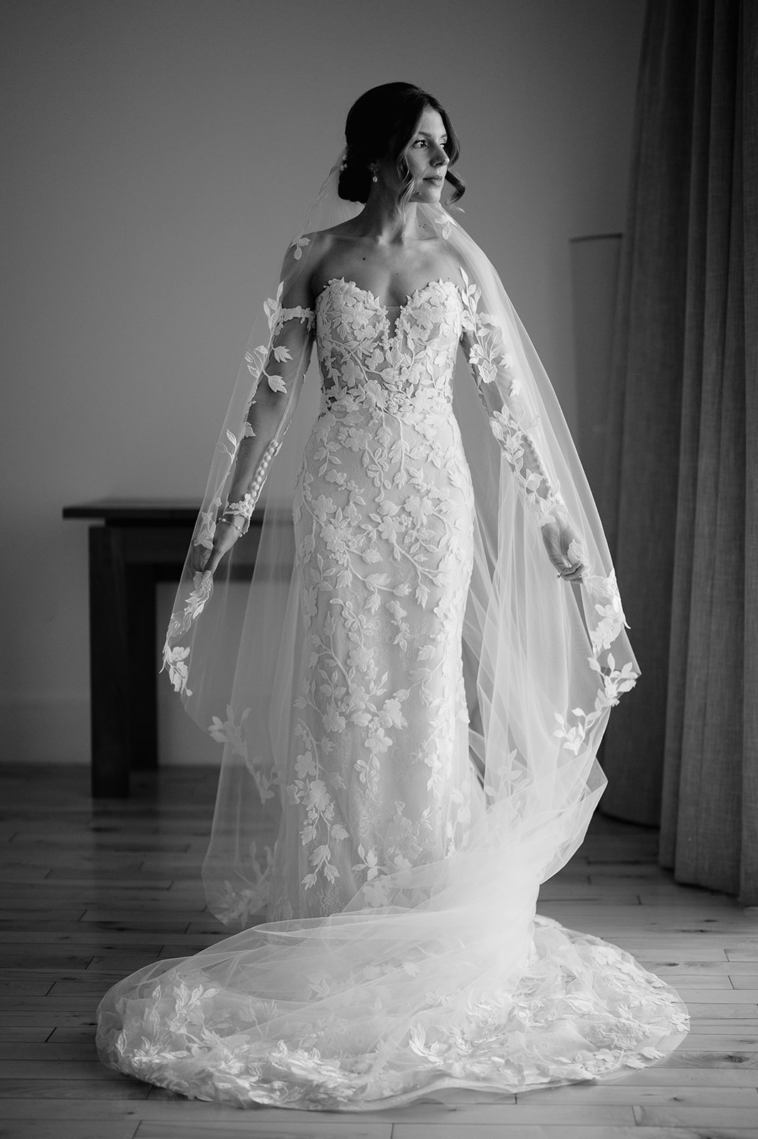 editorial portrait of bride with veil in black and white