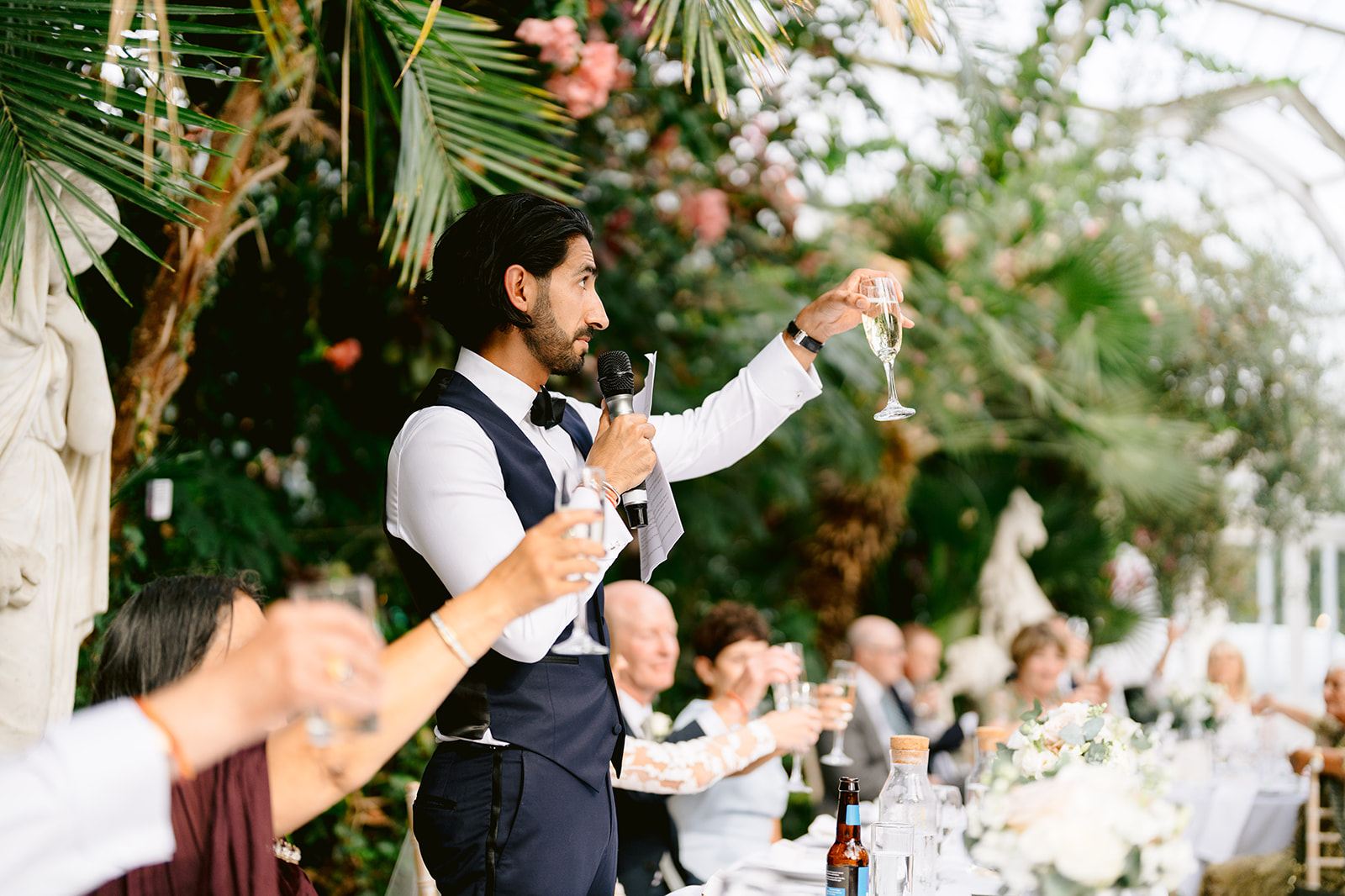 groom doing toast
