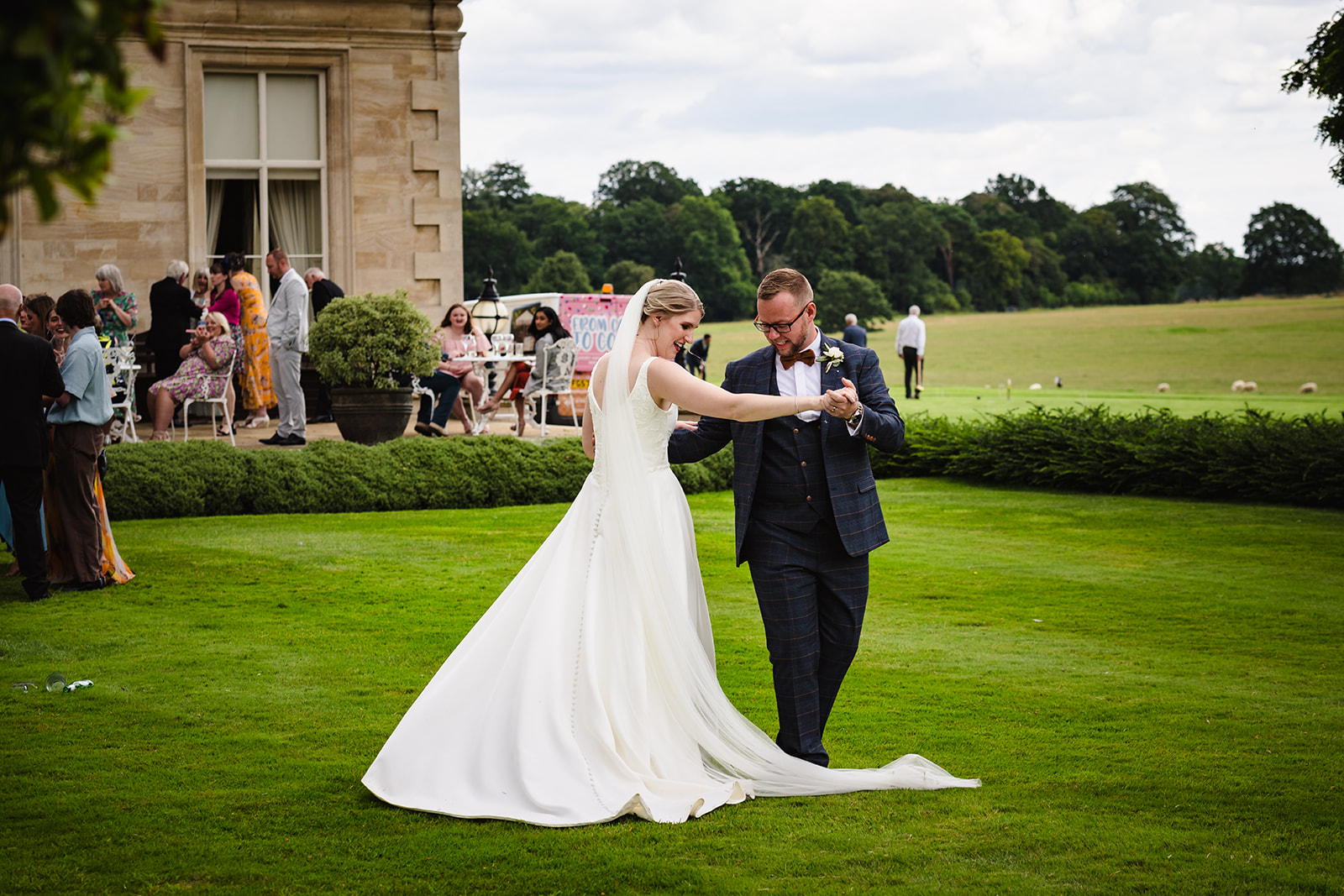 bride and groom dancing at stapleford park 