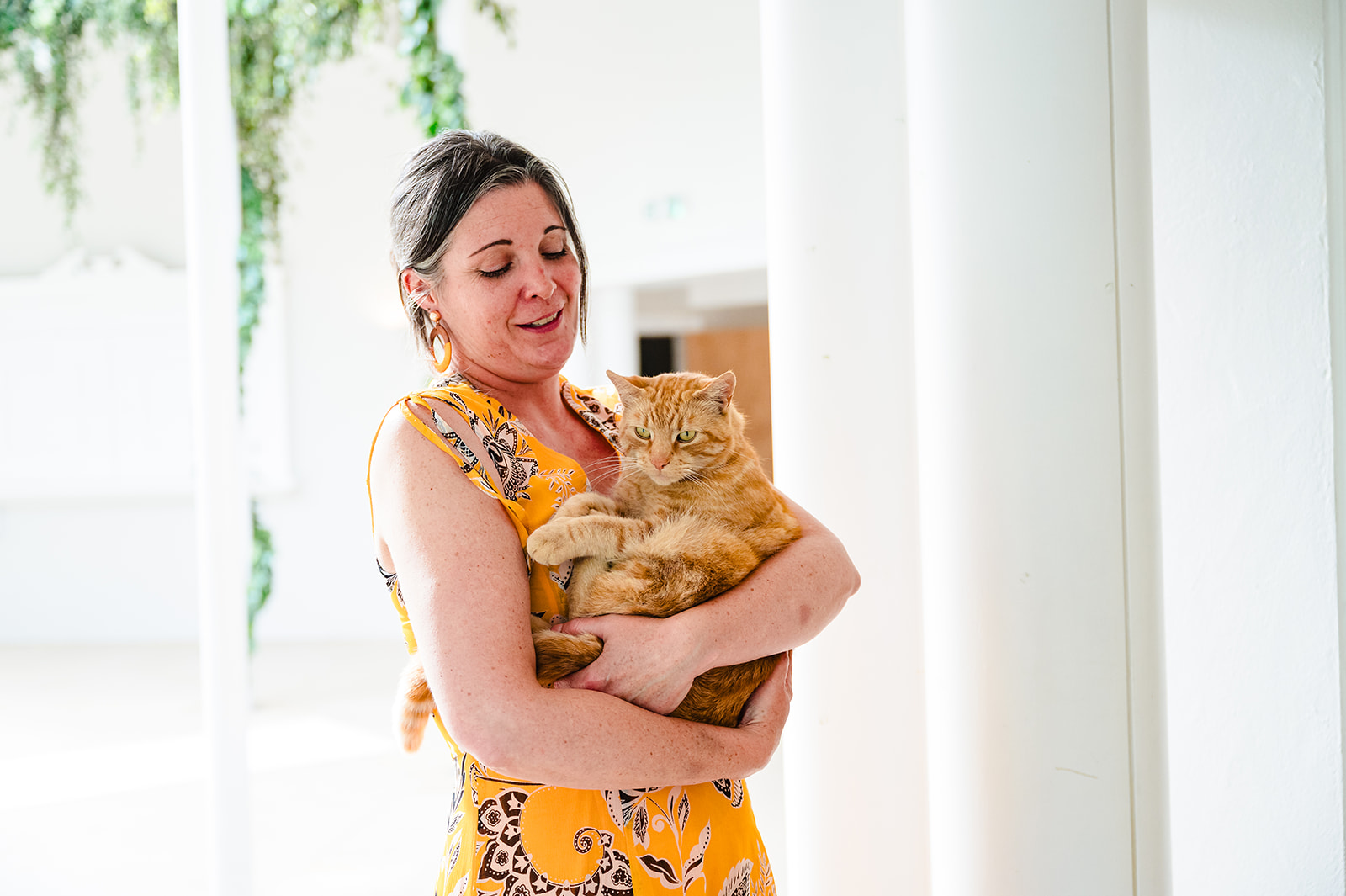 lady holding a cat stapleford park hotel