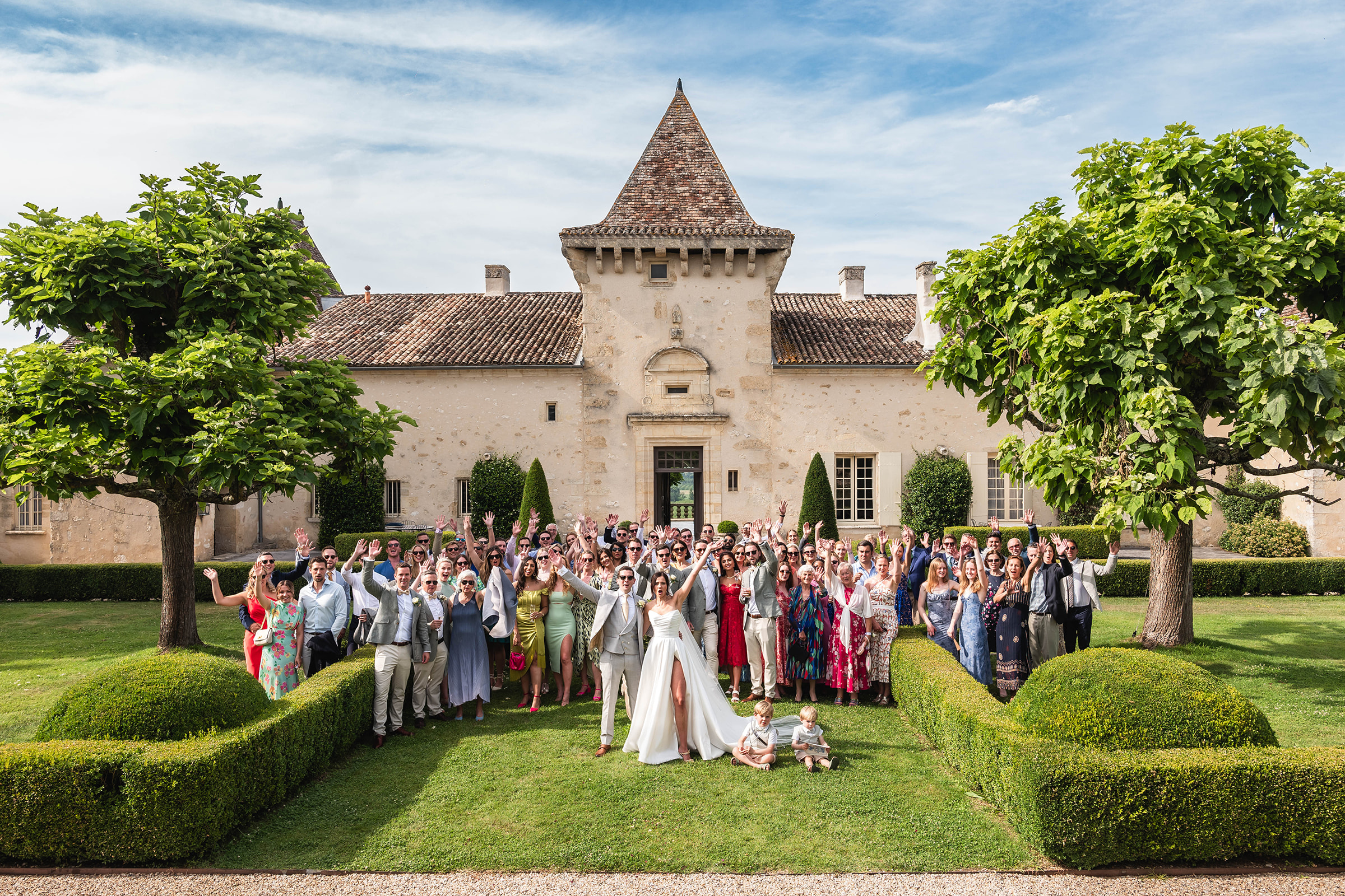 happy group in front of Chateau Soulac