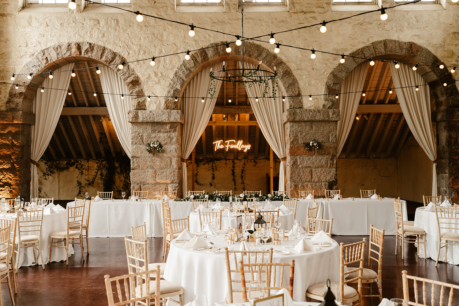Lush greenery wedding reception at The Coos Cathedral