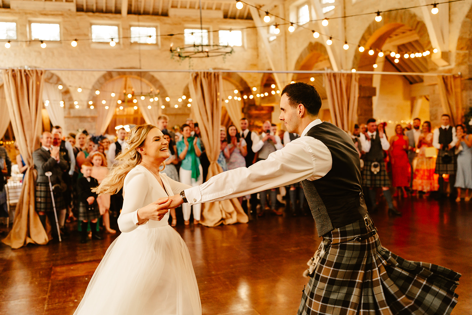 Couple having their first dance  at The Coos Cathedral