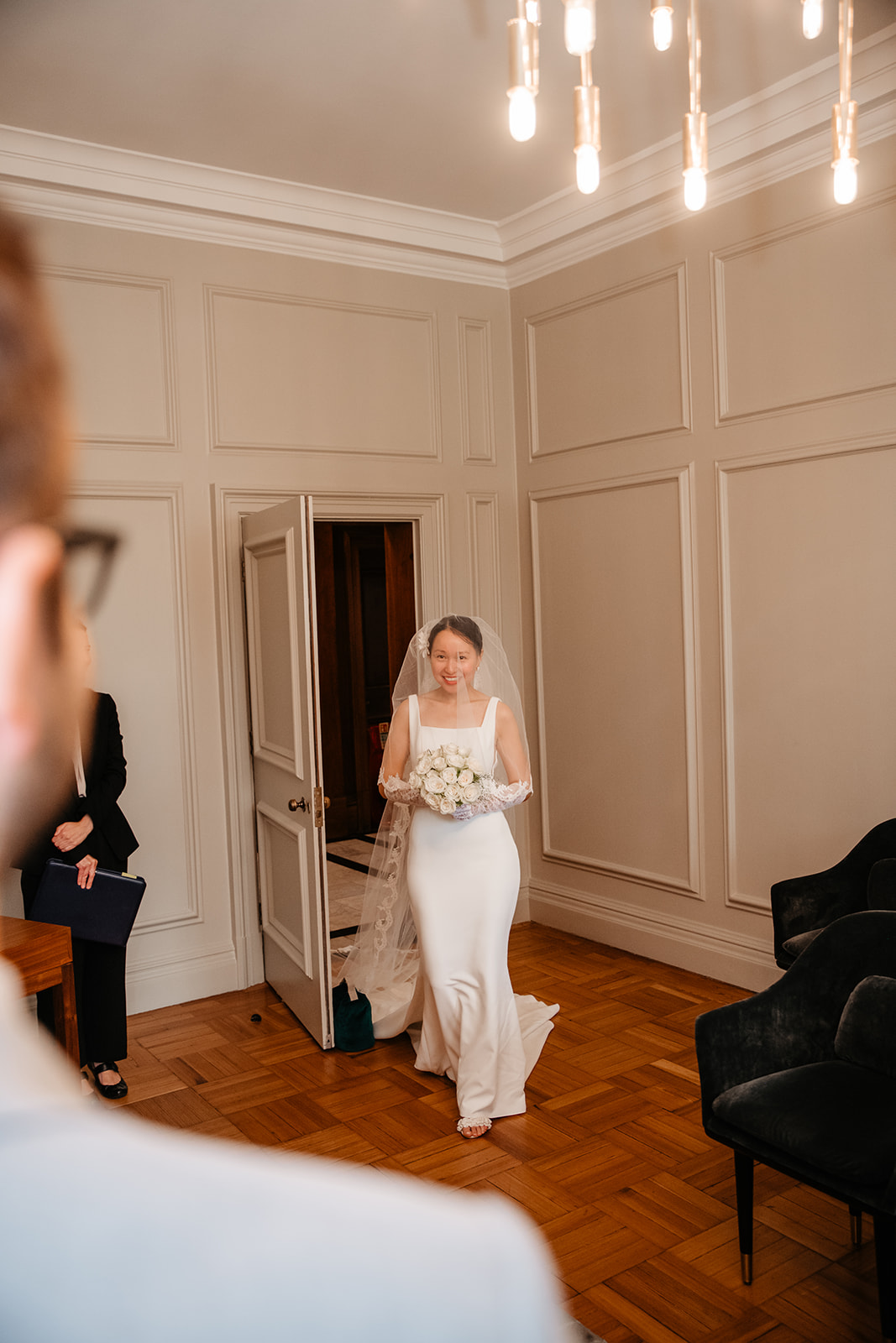 Bride entering the wedding Ceremony at Old Marylebone Town Hall in London