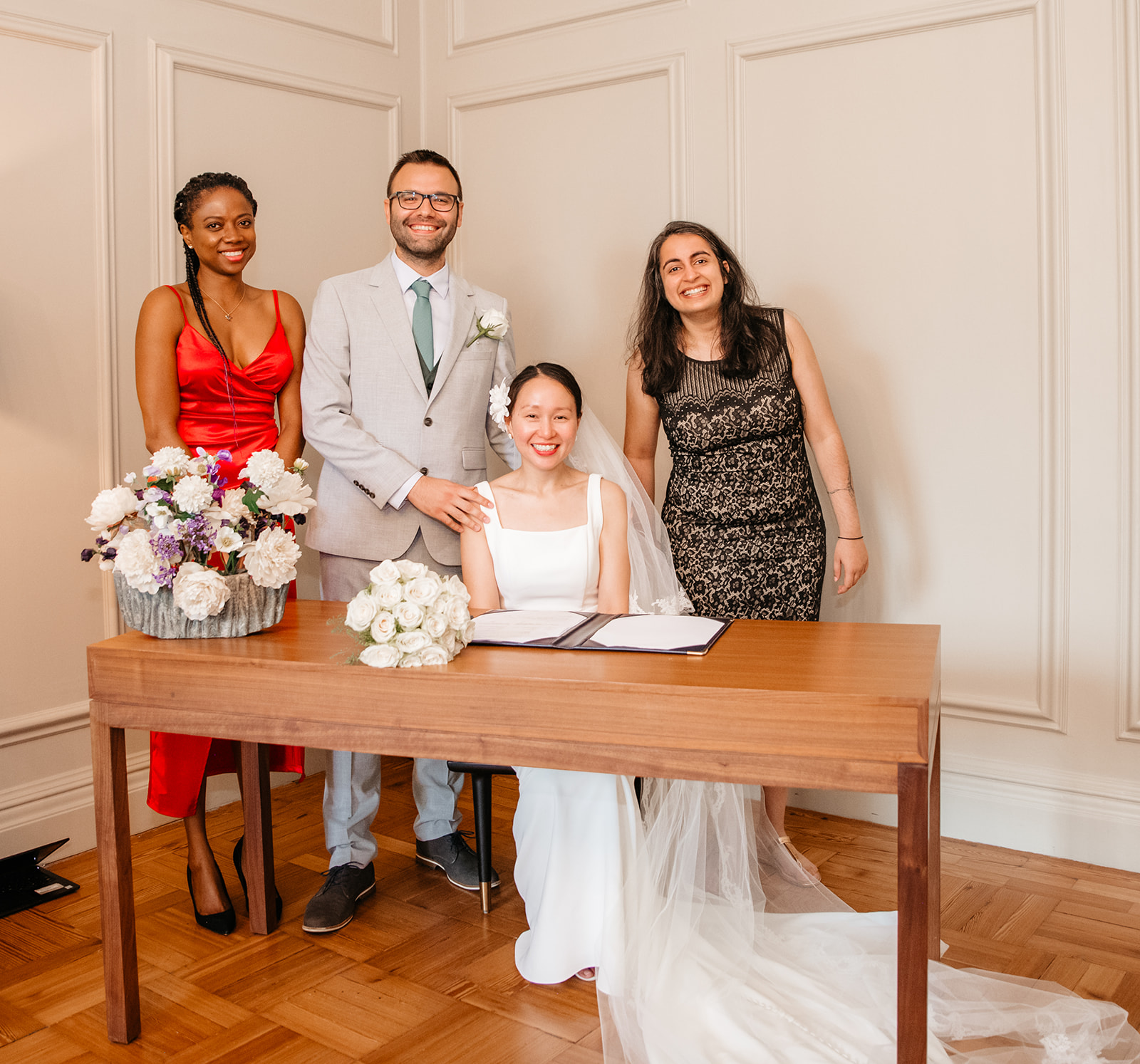Couple signing the wedding book at Old Marylebone Town Hall in London