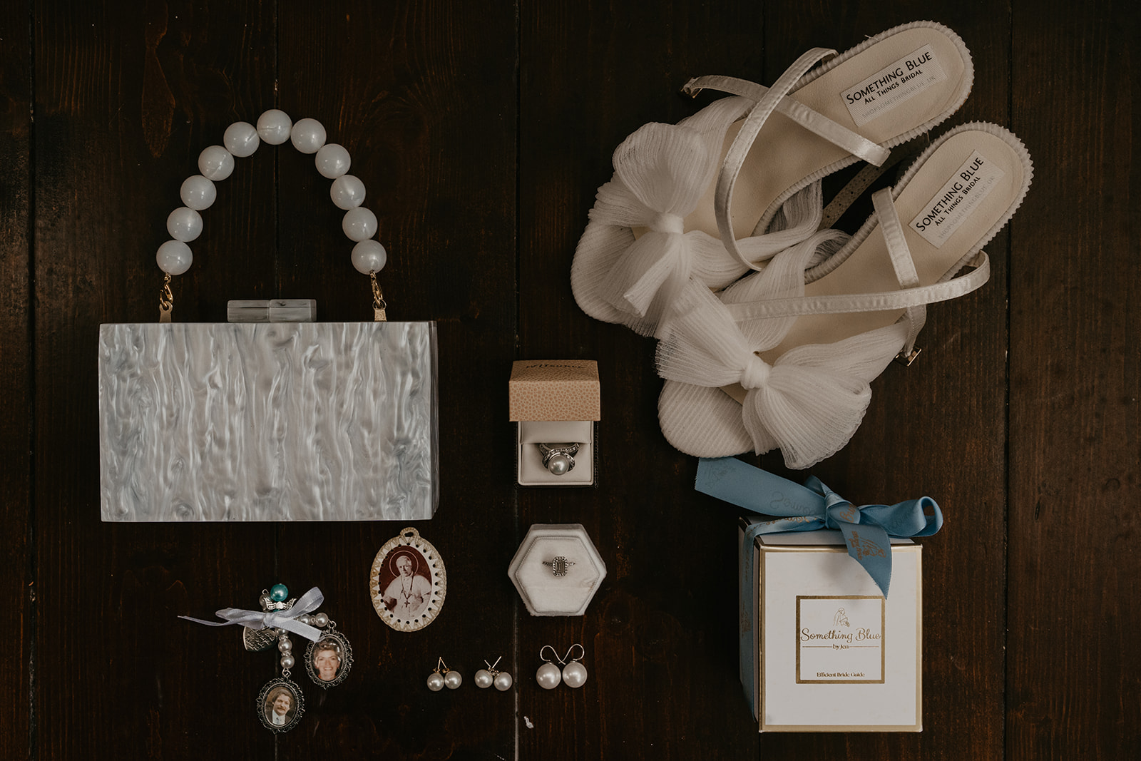 A bride news her accessories! This is a flatlay of Kelly-Marie's accessories for her big day.