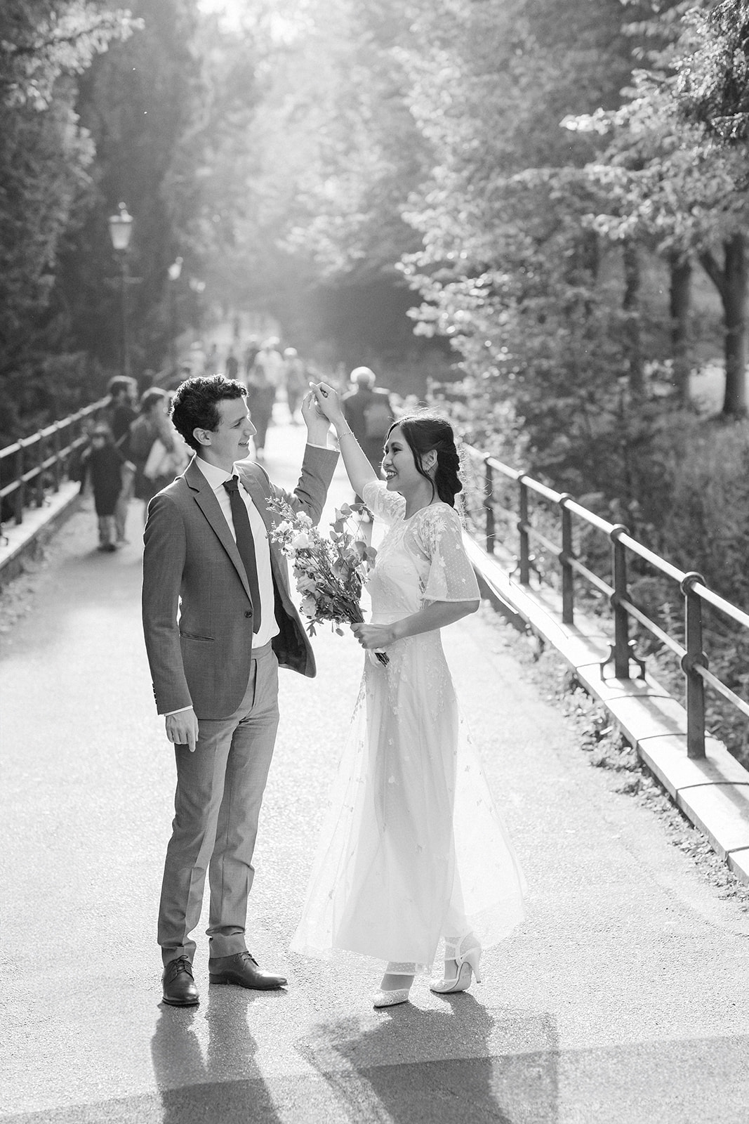 black and white image of wedding couple in cambridge park 