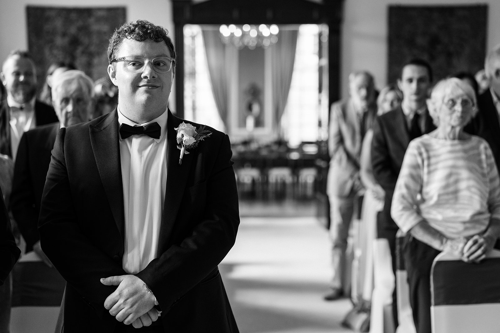 Hemswell Court Wedding Photography - groom waits patiently for the start of the wedding ceremony