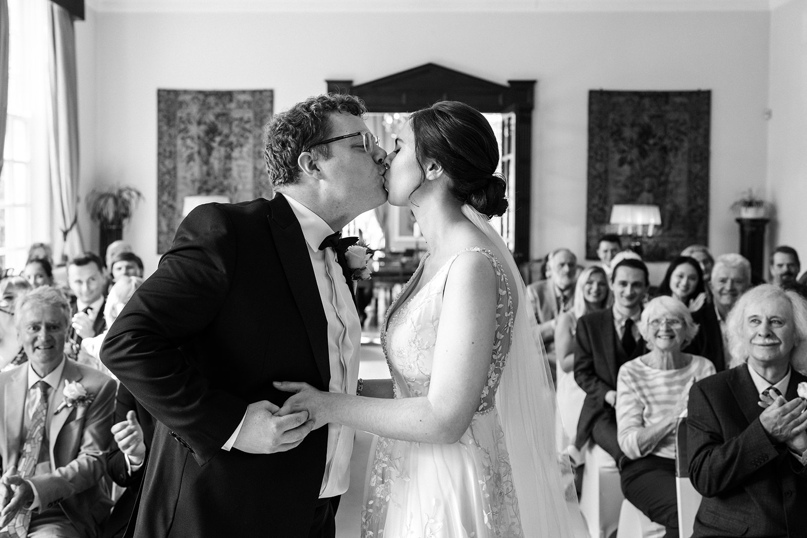 Hemswell Court Wedding Photography - bride and grooms first kiss