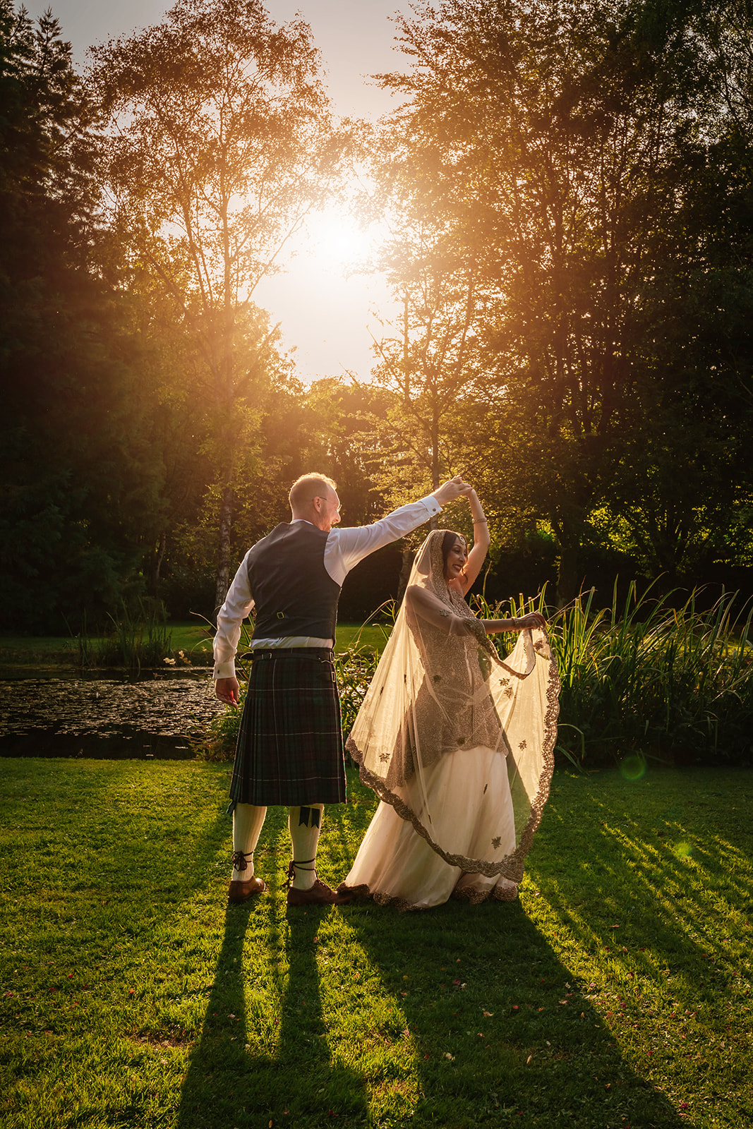 sunset dancing couple Zara Davis Wedding Photography Waters Edge Ewen Cotswolds Gloucestershire Cirencester cheltenham