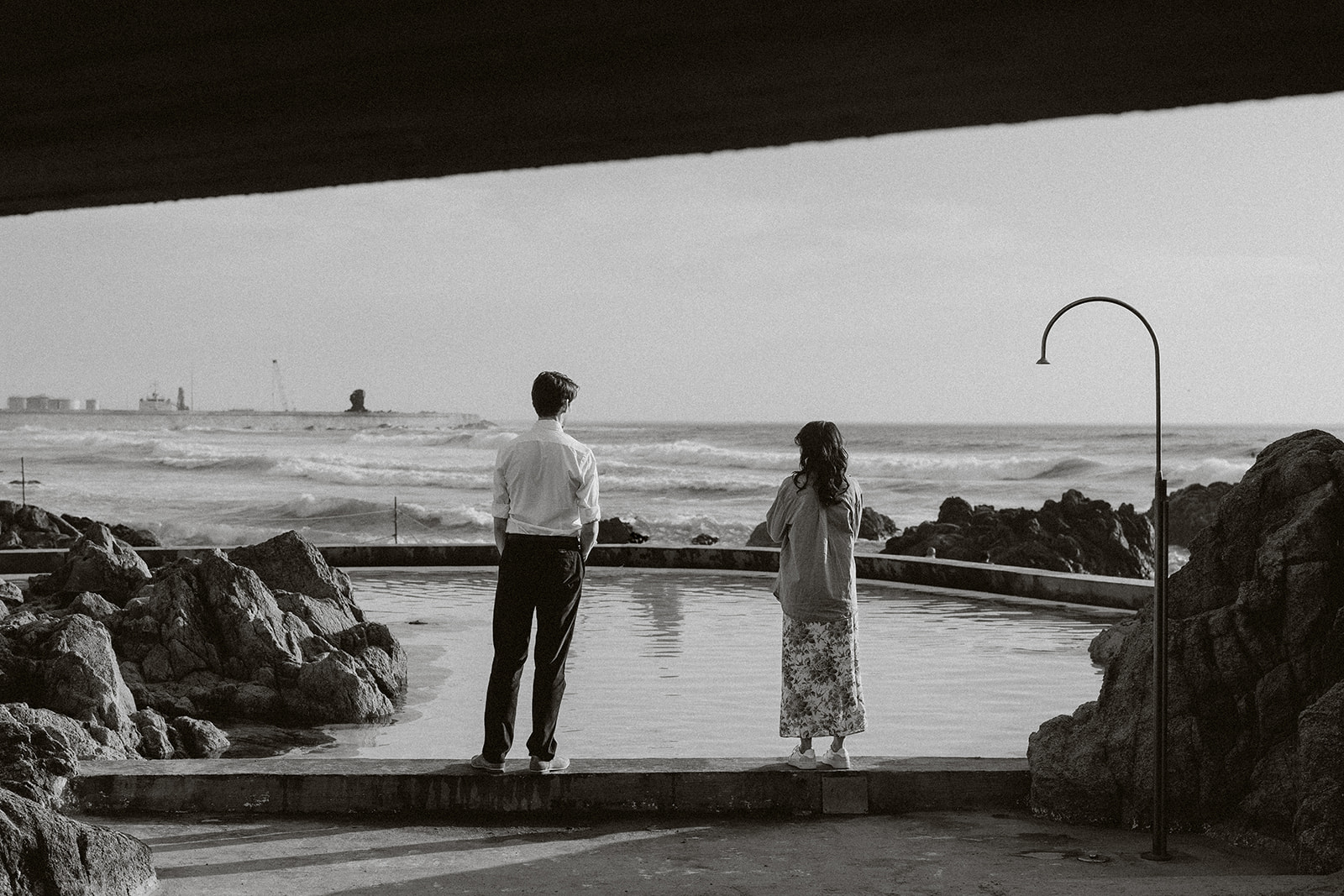 An ocean inspired editorial architectural engagement session in Siza Vieira's Tidal Pools and Boa Nova Tea House.