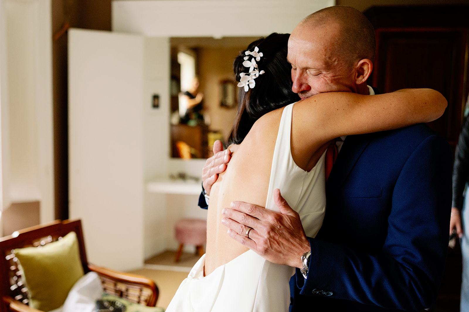 bride hugging her dad when he sees her in her grace loves lace wedding dress for the first time