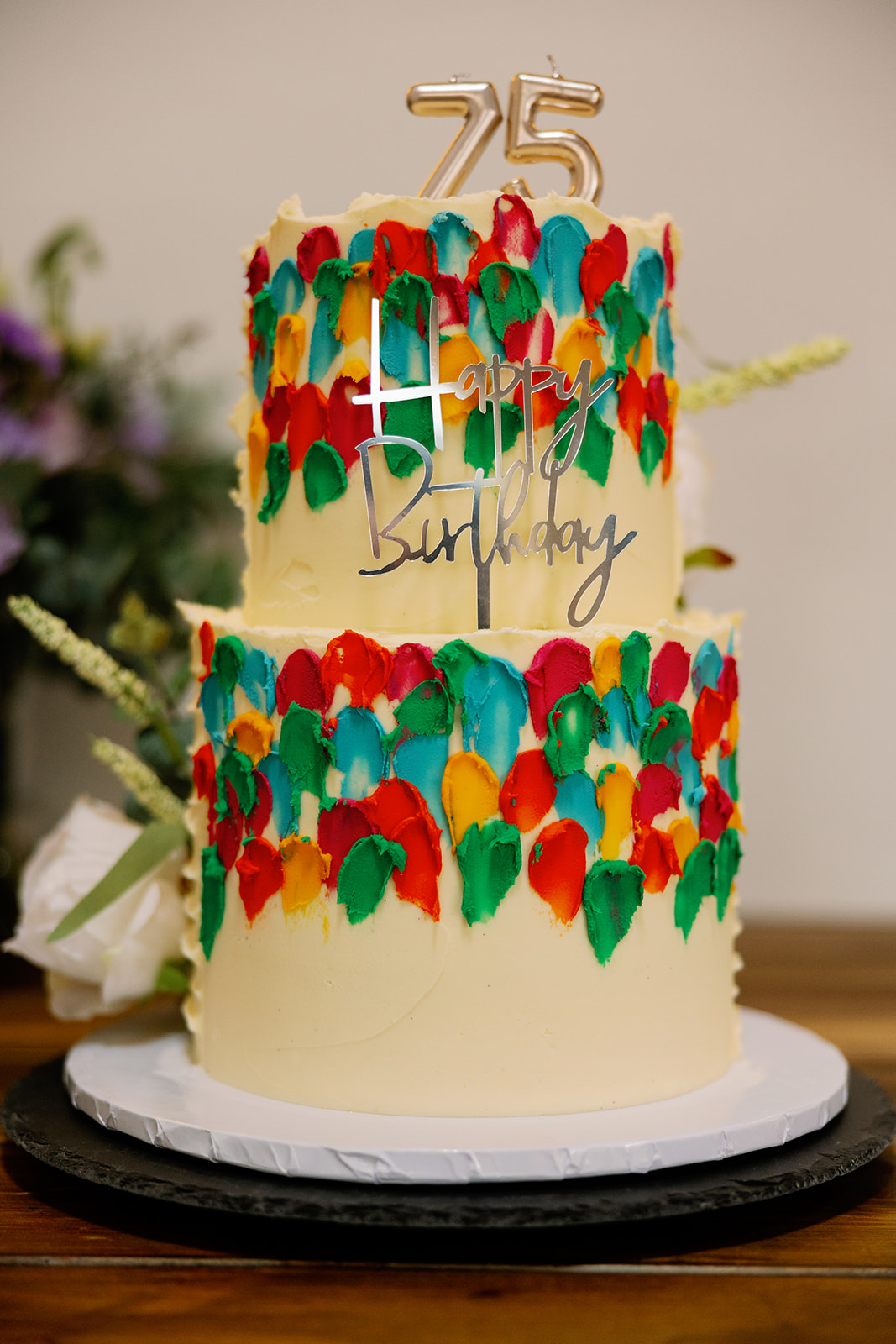 a dual birthday and wedding cake