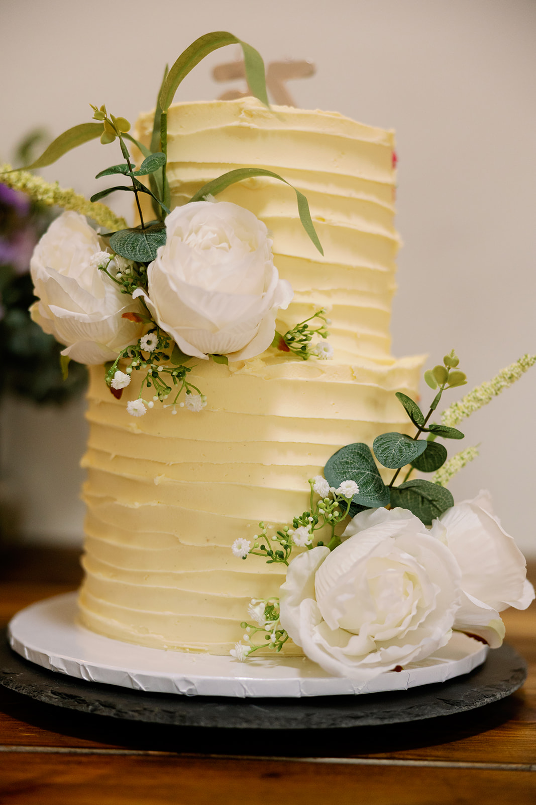 a dual birthday and wedding cake