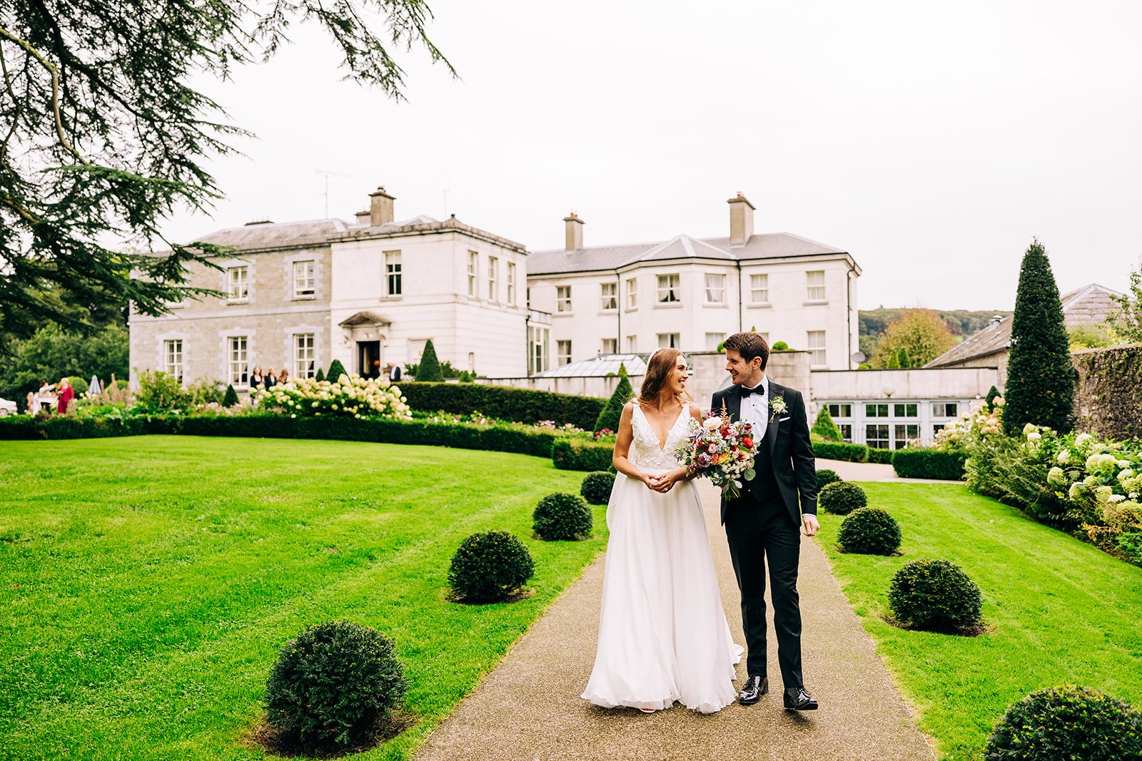 orla and Ronan pose for some wedding photos in tankardstown house
