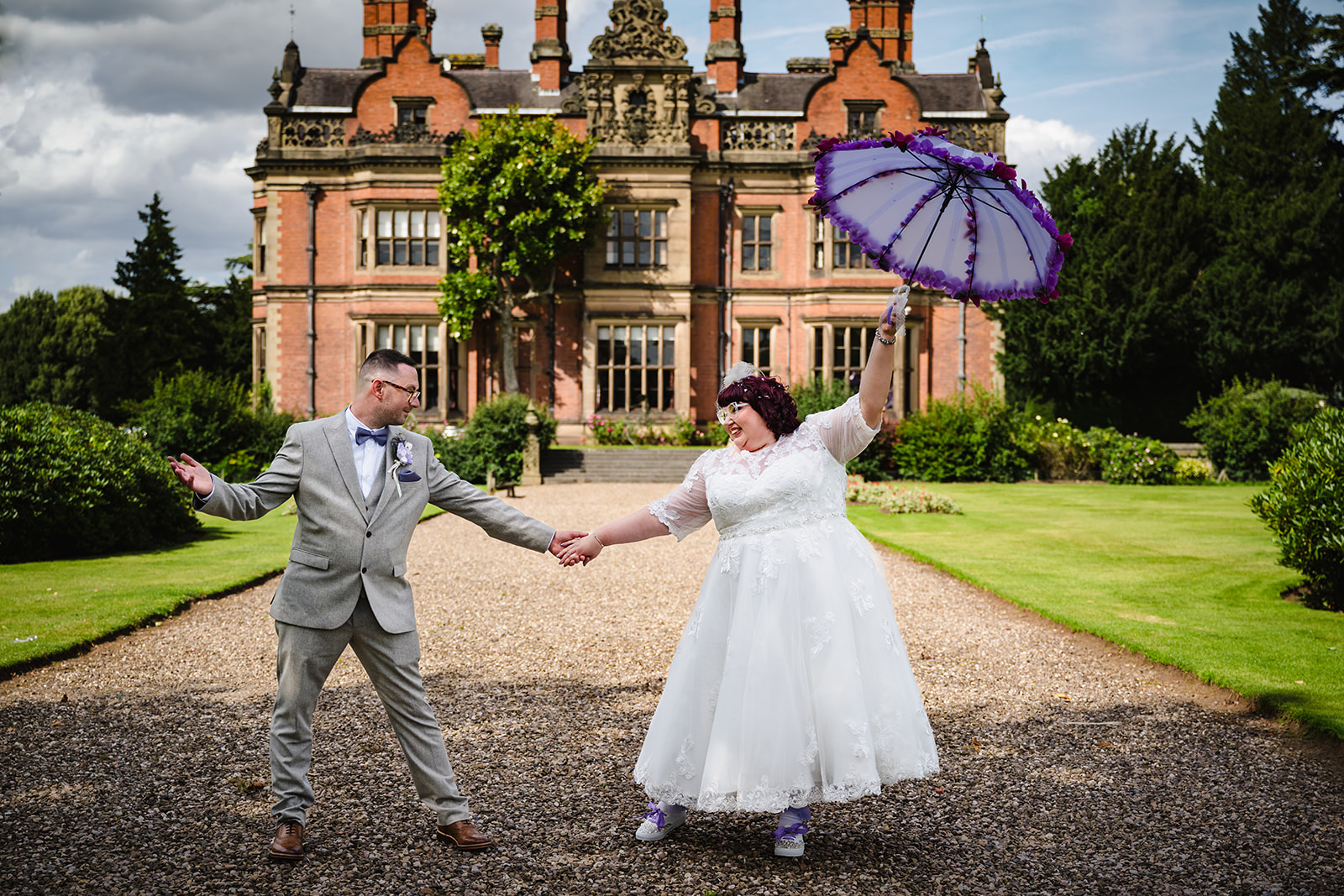 Bride and groom in front of beaumanor hall