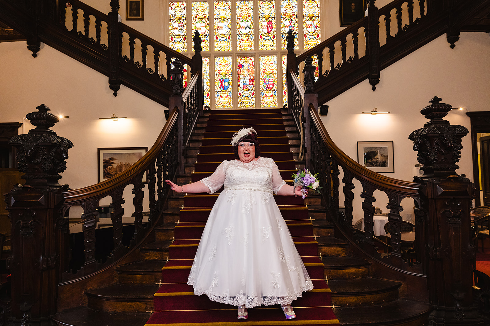 Bride at Grand staircase in Beaumanor Hall