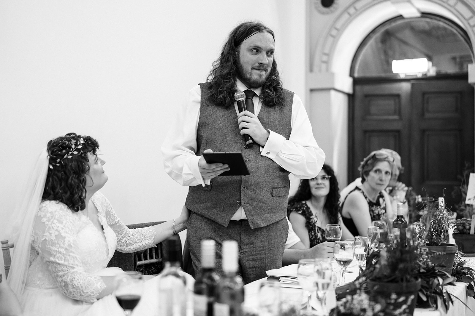 The groom getting emotional during his wedding speech at Wollaton Hall