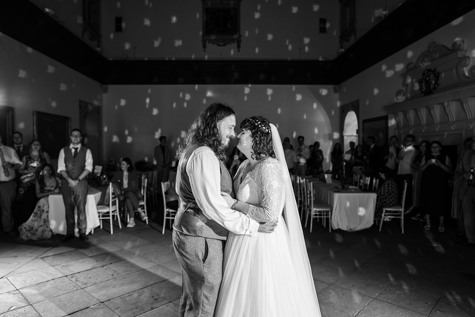 Bride and groom dance during their first dance at Wollaton Hall