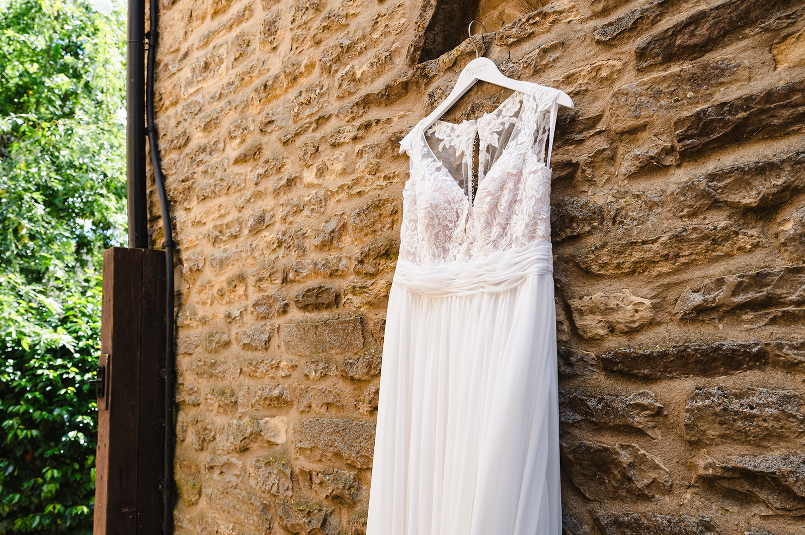 wedding dress hanging up at the barnsdale