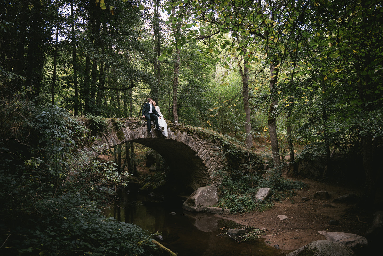 Wedding photos on an old bridge in central France