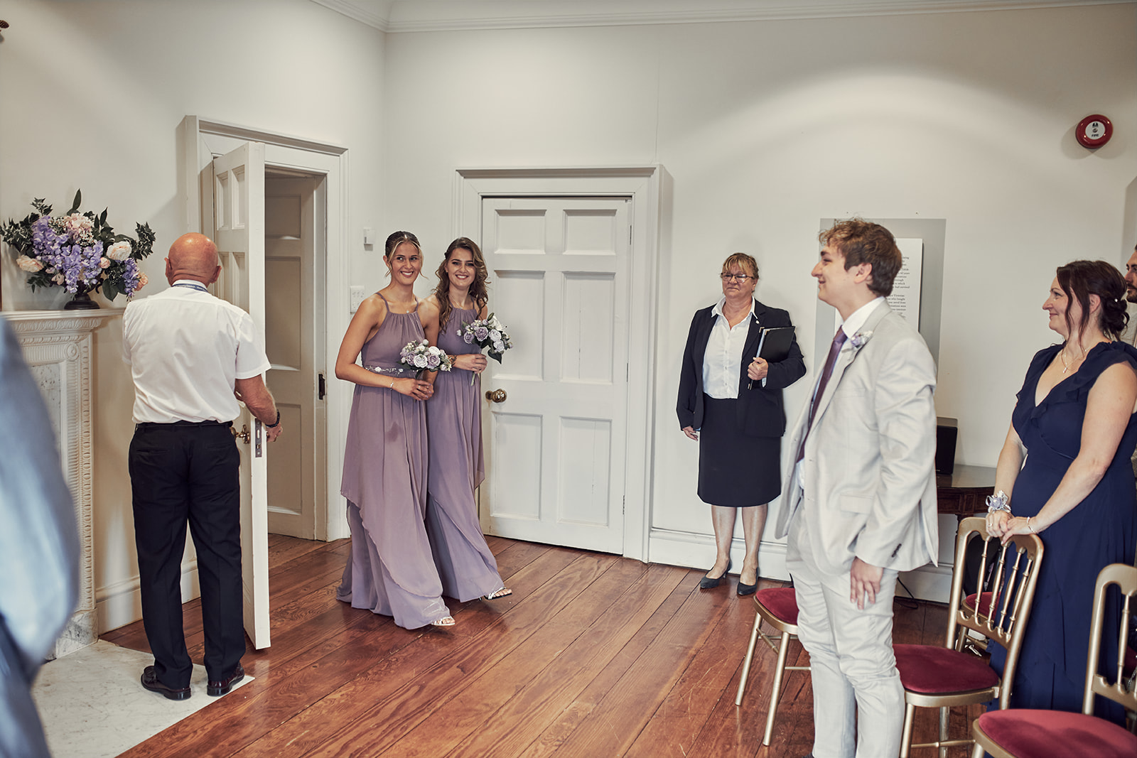 bridesmaids enter the room