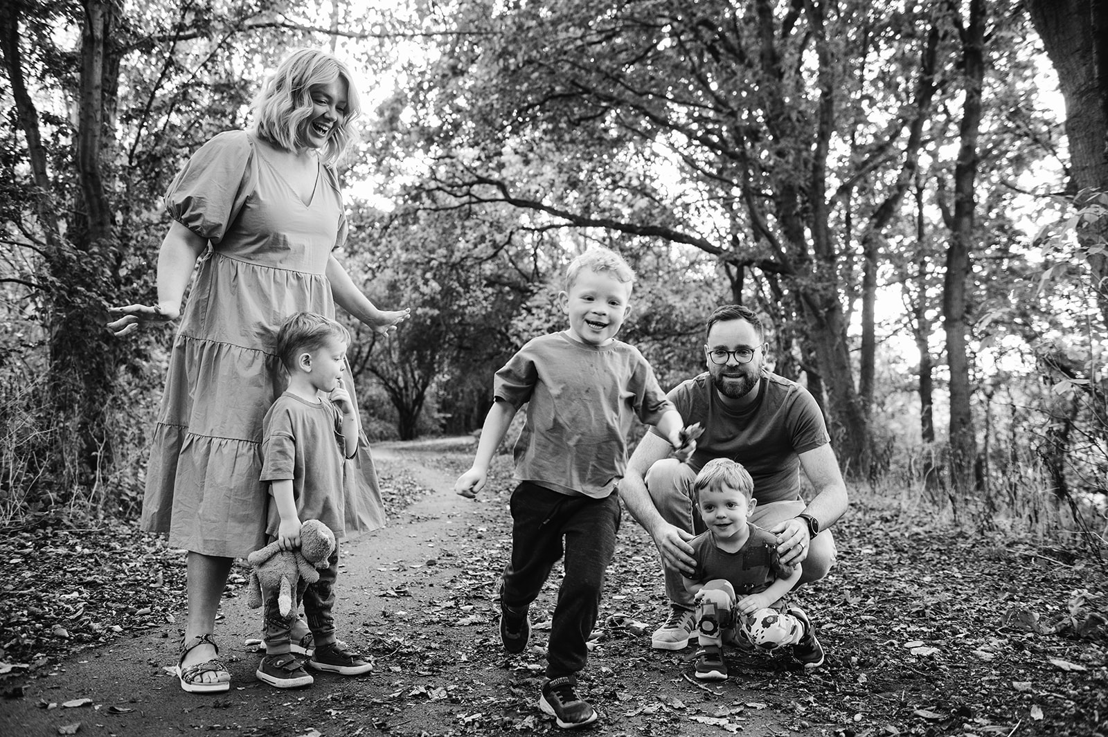 Lively family photos for a family of 5 going for a walk