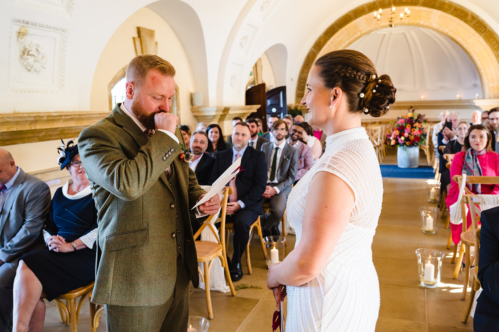 groom looking at his wife to be during normanton church wedding ceremony