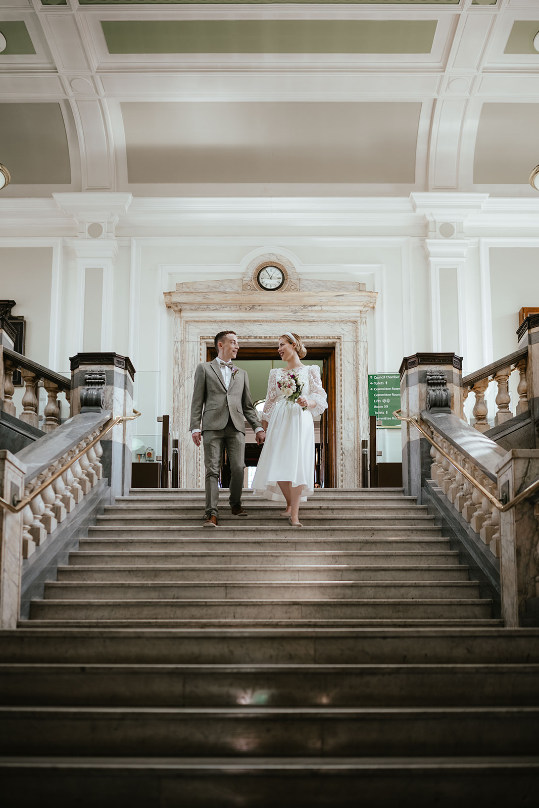 Portrait of Alex and Christina on the steps of Islington Town Hall