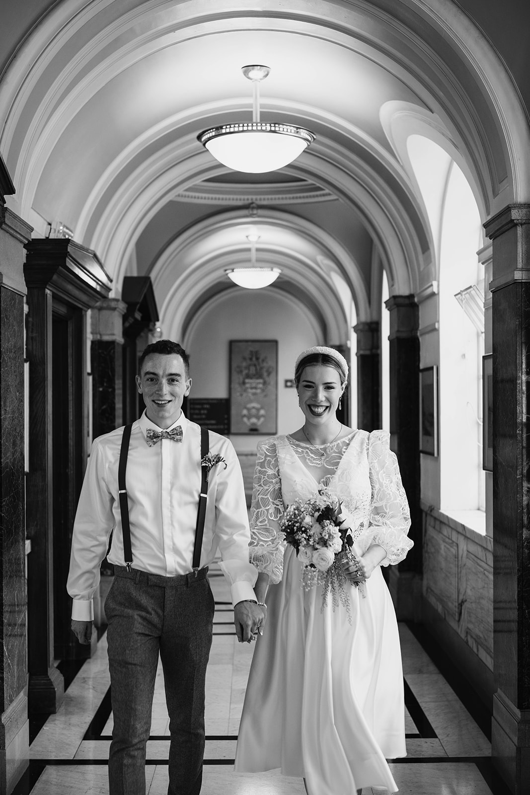 Stunning portrait of Alex and Christina in the hallway at Islington Town Hall