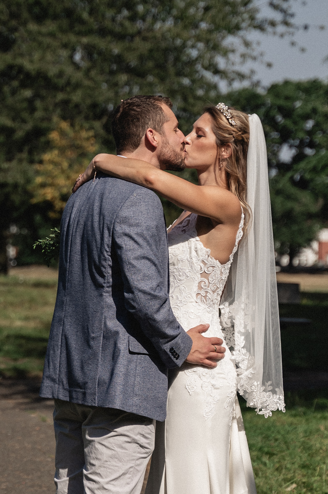Stunning portrait of Natalie and George kissing at Ashburton Hall