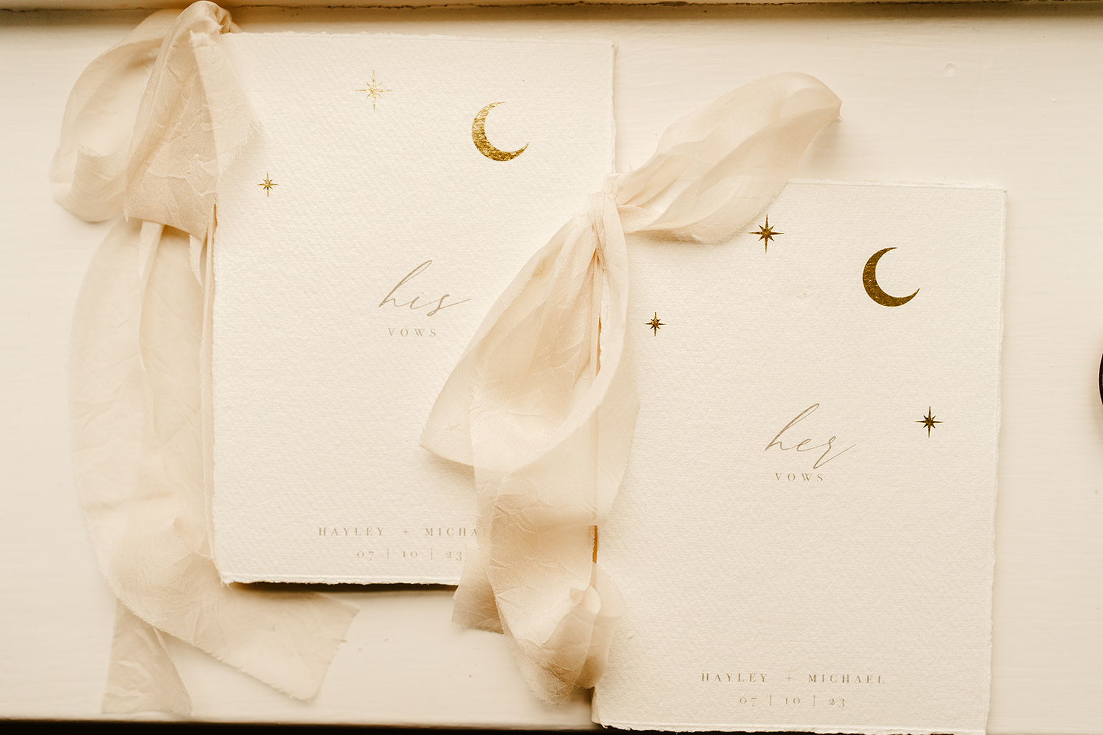 wedding vow cards with celestial print on them