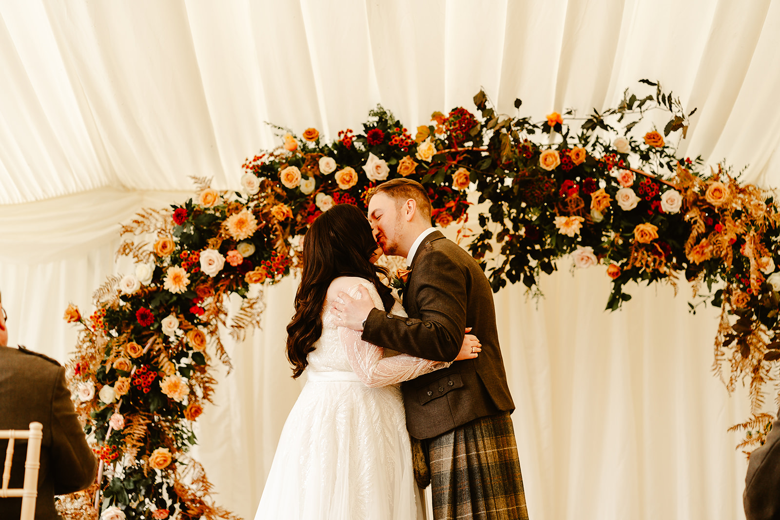 couple have their first kiss during ballogie house wedding ceremony