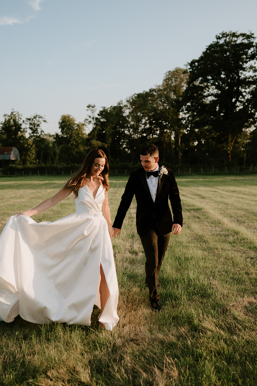 bride and groom at golden hour at barns and yard