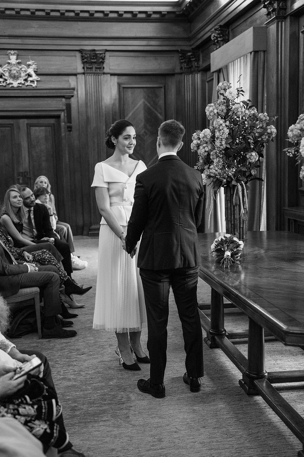 bride and groom saying vows at Marylebone old town hall