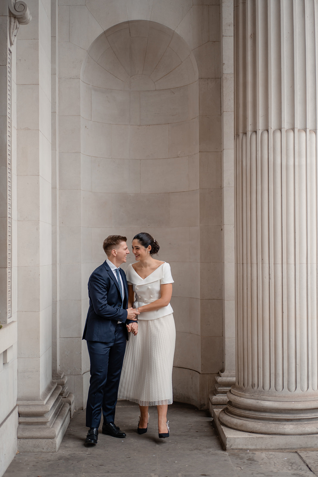 A couple getting married at Marylebone old town hall