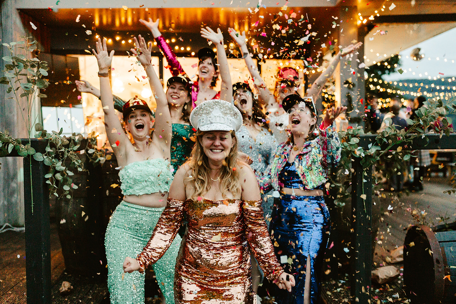 confetti falls on guests at Venachar Lochside wedding venue